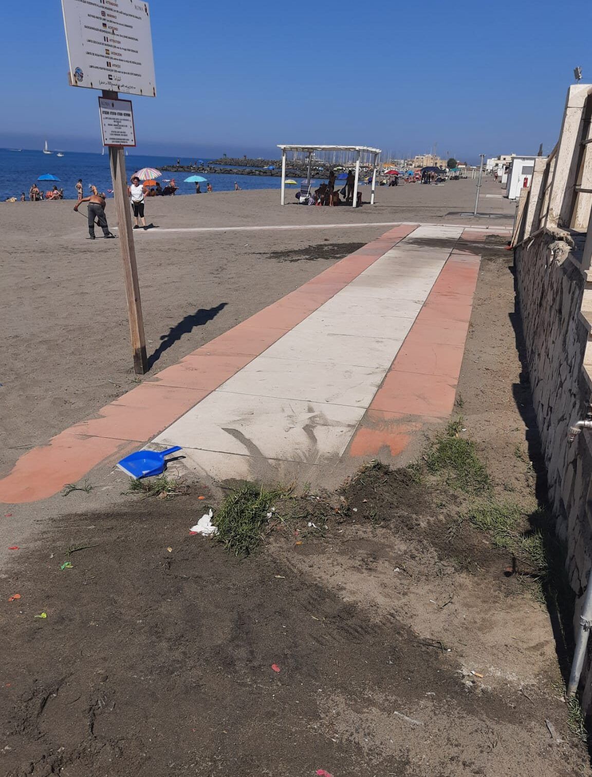 pulizia spiaggia Ostia