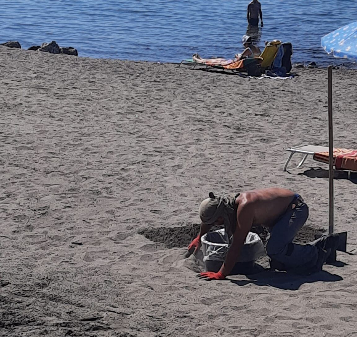 pulizia spiaggia Ostia