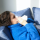 L'influenza australiana sta colpendo sempre più italiani, costringendoli a letto per una settimana. Quali sono i sintomi?