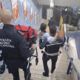 Ragazza disabile portata in braccio al Colosseo a Roma