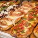 Costo della pizza al taglio in un panificio romano