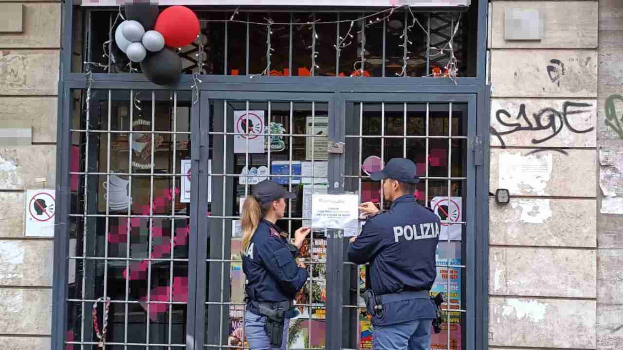 negozio chiuso polizia casilina Roma
