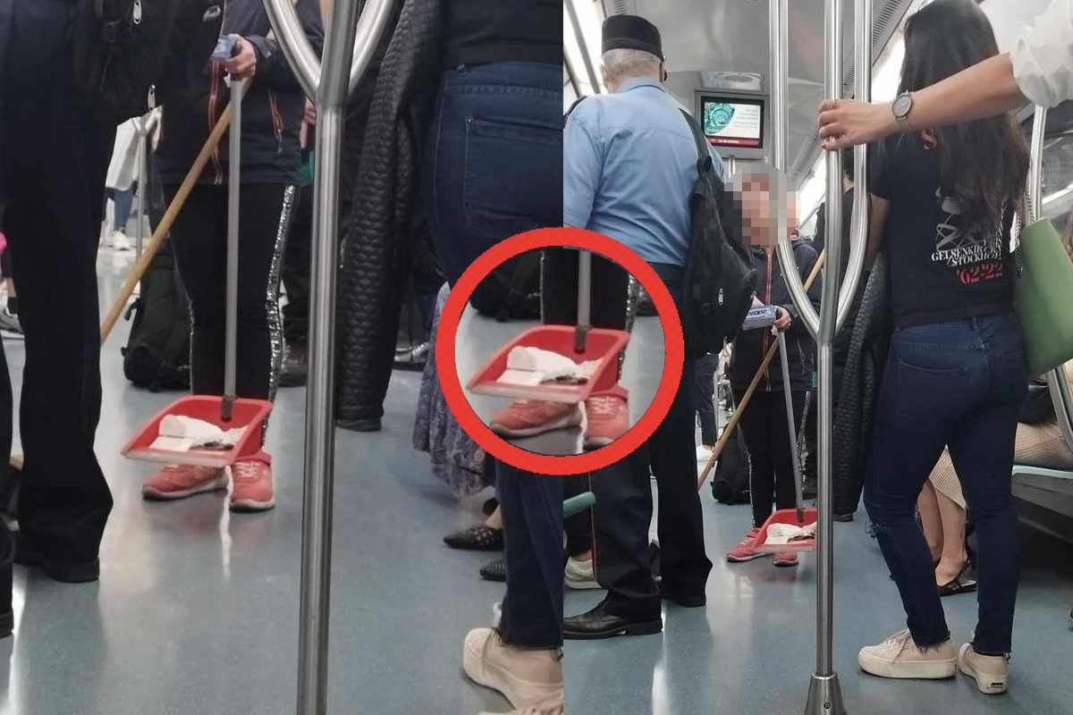 Foto signora che pulisce vagone metro a Roma